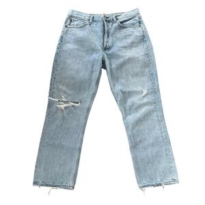 Light wash Riley Agolde high rise distressed jeans. 23” waist. Vintage style